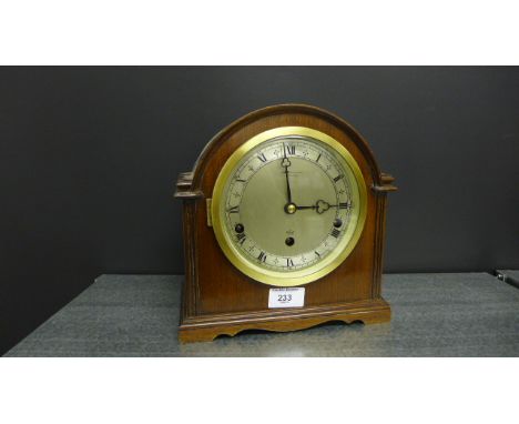 Elliot of London mahogany cased mantle clock, circa mid-20th century, with Westminster chimes, the circular silvered dial wit