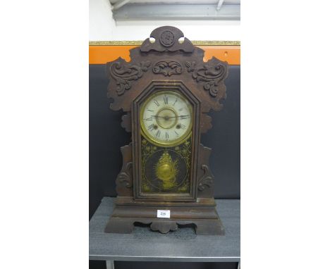 Newhaven Clock Co wall clock, the arched and gilt decorated trunk door opening to reveal the silvered dial and pendulum, in c