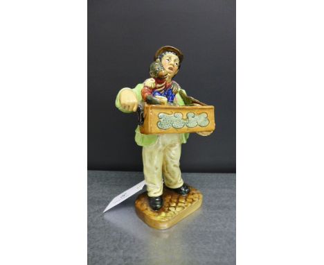 Royal Doulton figure 'Organ Grinder' HN2173 modelled by M. Nicoll, with printed backstamp and impressed numbers, 23cm high