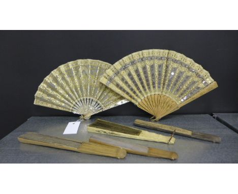 A sequined fan with mother of pearl guards together with three paper fans and a gauze and ivory guard fan and another (6) 