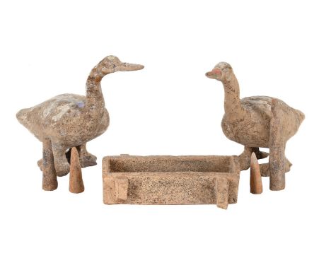 A PAIR OF CHINESE POTTERY MODELS OF GEESE HAN DYNASTY 13cm high  TOGETHER WITH A hand modelled pottery trough together with f