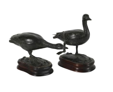 λ PATRICIA NORTHCROFT, A COMPANION PAIR OF PATINATED BRONZE MODELS OF GEESE  Modelled walking, each mounted on a carved wood 