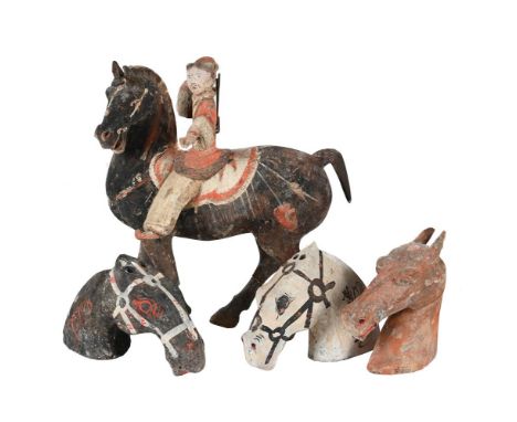 A CHINESE POTTERY FIGURE OF A HORSE AND AN ARCHER HAN DYNASTY With report on thermoluminescence analysis  29cm high   TOGETHE