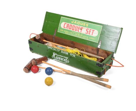 JAQUES LONDON FOR HARRODS; A CASED CROQUET SET  MODERN  In green wooden case  Four mallets, four balls, six metal hoops, winn