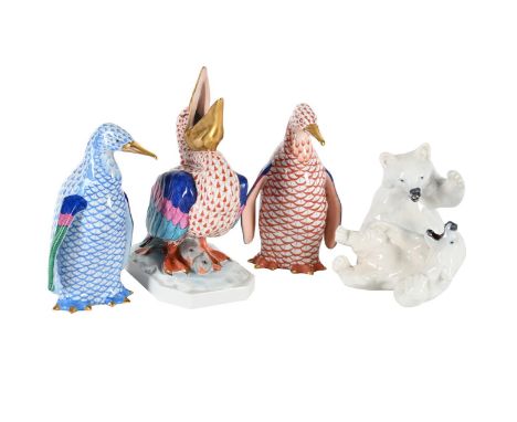 A COLLECTION OF THREE MODERN HEREND MODELS OF ANIMALS  Comprising two penguins and a pelican Blue factory marks The pelican 2