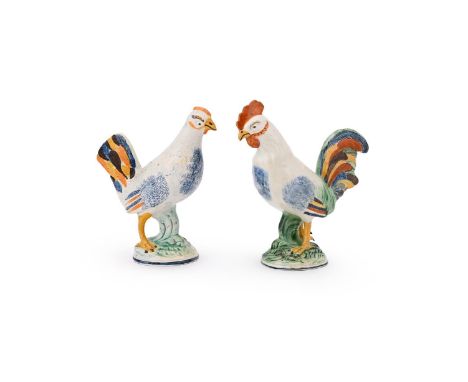 A PAIR OF STAFFORDSHIRE PEARLWARE MODELS OF A COCKEREL AND HEN  CIRCA 1800  Of Pratt family type  one 20.5cm, the other 22cm 