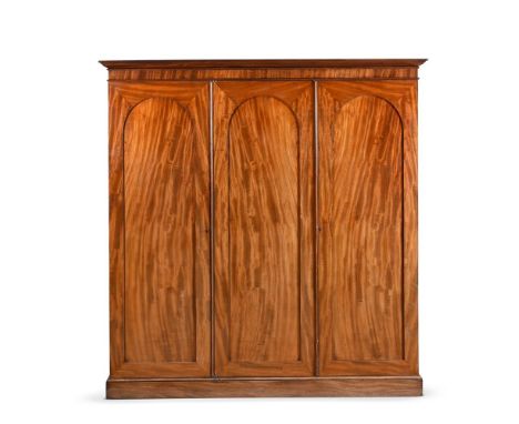 A VICTORIAN MAHOGANY WARDROBE  BY GILLOWS, MID 19TH CENTURY  One door opening to fitted drawers, the top drawer stamped 'GILL