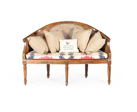 A FRENCH CANED CARVED BEECH SOFA  19TH CENTURY  97.5cm high, 144cm wide, 64cm deep   Provenance: The Estate of a deceased Gen