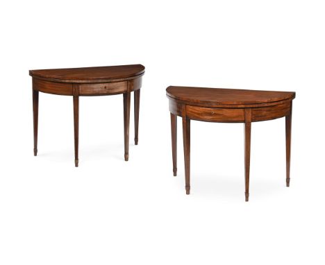 A PAIR OF GEORGE III MAHOGANY AND LINE INLAID DEMI-LUNE FOLDING TEA TABLES  CIRCA 1800  each 70cm high, 99cm wide, 46cm deep 