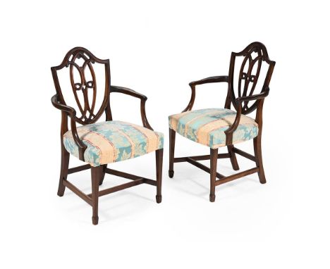 A SET OF TEN MAHOGANY DINING CHAIRS   IN THE MANNER OF DESIGNS BY GEORGE HEPPLEWHITE, FOUR CIRCA 1780 AND SIX LATER MADE TO M