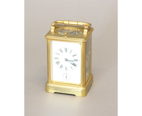 A 19th CENTURY BRASS CASED CARRIAGE CLOCK. With a rectangular white enamelled dial with Roman numerlas and subsidiary alarm d