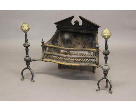 A GEORGE III STYLE FIRE GRATE. With an architectural cast back, open fire basket with decorative front rails, with tall proje