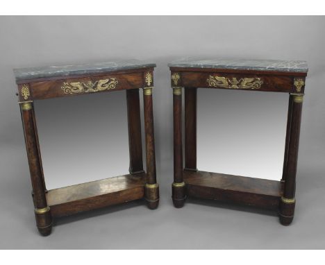 A PAIR OF FRENCH EMPIRE MARBLE TOPPED CONSOLE TABLES. Each with rectangular veined grey marble tops above a single frieze dra
