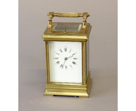A LATE 19th CENTURY BRASS CASED CARRIAGE CLOCK. With a rectangular white enamelled dial with Roman numerals and Arabic minute