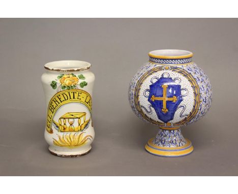 TWO 17TH CENTURY SPANISH DRUG JARS. Both brightly painted, one of traditional albarello form decorated with an hour glass ben