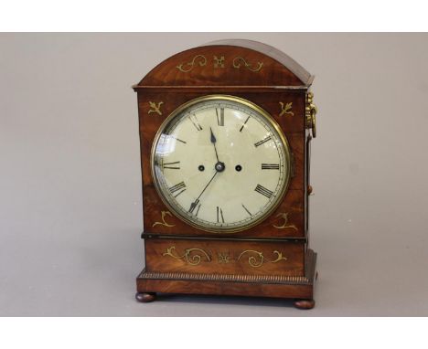 A REGENCY BRASS INLAID MAHOGANY BRACKET CLOCK. With a circular convex cream painted dial with Roman numerals, with a two trai