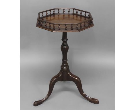 A GEORGE III MAHOGANY WINE TABLE, the octagonal galleried top on tripod base, 69cm high, 40cm wide