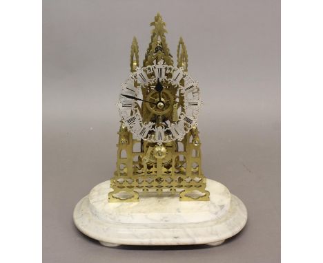 A VICTORIAN STYLE BRASS SKELETON CLOCK. With a fretted chapter ring with Roman numerals, with an eight day single train chain