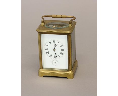 A 19th CENTURY BRASS CASED CARRIAGE CLOCK. With a rectangular white enamelled dial with Roman numerals and subsidiary Alarm d