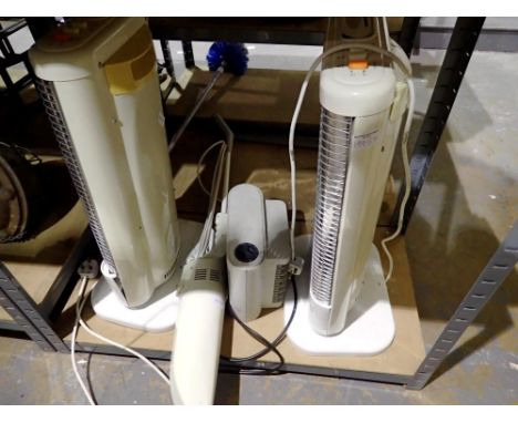 Two halogen heaters and a fan heater together with a Bissell magic broom. All electrical items in this lot have been PAT test