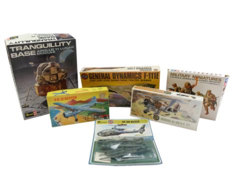 A group of vintage model kits including a 1969 Revell Tranquility Base (Apollo 11 Lunar Module), a 1975 Airfix General Dynami