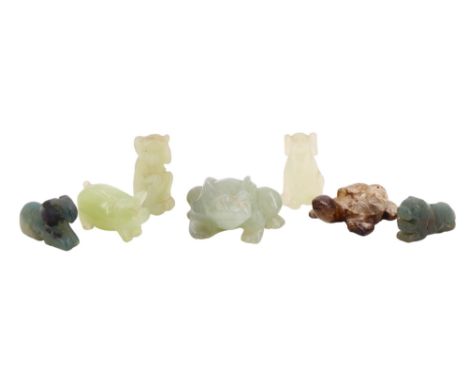 Four carved jade or similar animal figurines comprising a frog, tortoise, pig and a dog, together with three ojime type jade 