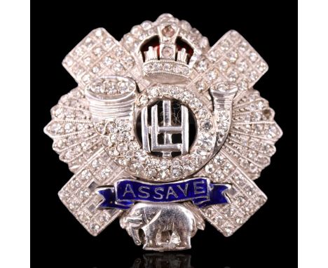 A Highland Light Infantry precious white metal, enamel and paste sweetheart brooch, (tested as white gold and stamped 9 ct), 