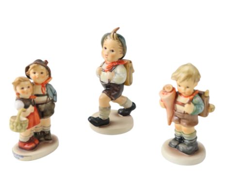Three Goebel Hummel figurines, tallest 13 cm