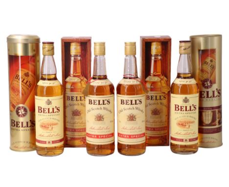 Four boxed bottles of Bell's Extra Special Scotch Whisky, two 75 and two 70 cl