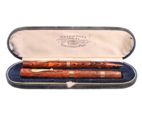 A cased vintage Waterman Clip Cap fountain pen and propelling pencil duo, both with 9 ct gold collars