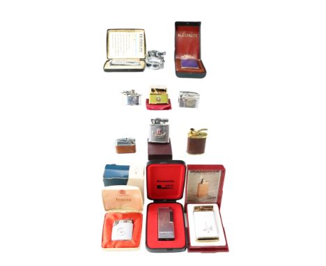 A group of cigarette lighters including a cased Ronson Varaflame, a musical gas lighter, table lighter inserts, etc