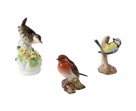 A Beswick Robin figurine together with Goebel Blue Tit and Royal Adderley bird figurines modelled by Barbara Linley Arlams