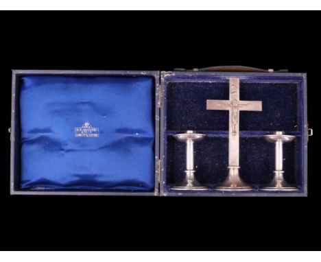 A cased portable silver Christian altar set, comprising a Crucifix and a pair of candlesticks, A R Mowbray &amp; Co Ltd, Lond