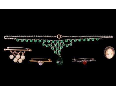 A carnelian set white metal bar brooch, marked 'Silver', together with four items of vintage costume jewellery, 13 x 43.5 mm