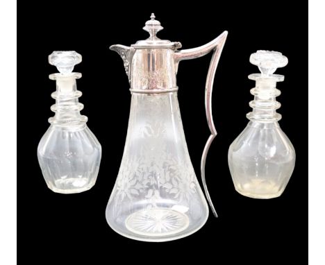 A late 19th / early 20th Century electroplate mounted glass claret jug decorated with wheel-cut bow-tied swags and flora, tog