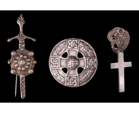 A 1930s Scottish silver Celtic cross boss brooch, Wilson & Sharp, Edinburgh, 1936, (4 cm), together with a white metal brooch