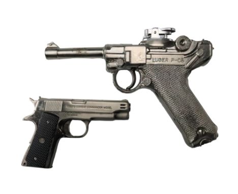 A novelty Luger P-08 pistol cigarette lighter together with a Colt MK IV