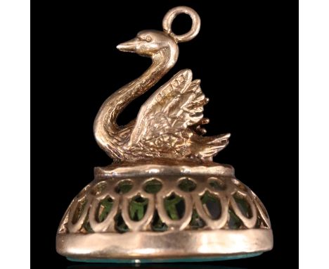 A 9 ct gold fob seal, the oval jade matrix intaglio engraved in depiction of a classical helmeted profile, London, 1975, 7.75