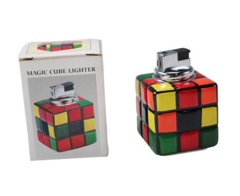 A boxed Rubix Cube form ceramic table cigarette lighter, 8.5 cm