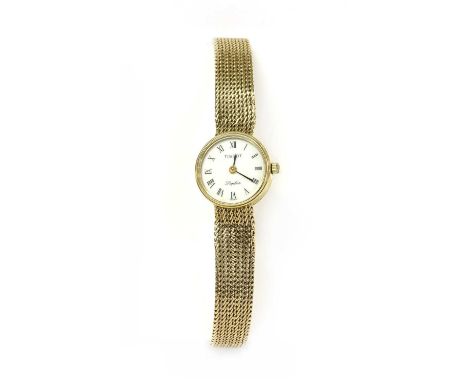 A ladies' 9ct gold Tissot 'Saphir' quartz bracelet watch, with a circular white dial with black Roman numerals and hands, int