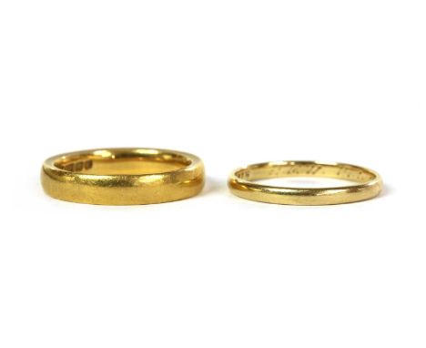 Two gold wedding rings, to include a 22ct gold wedding ring, Birmingham 1908, 5.68g, together with a gold wedding ring, teste