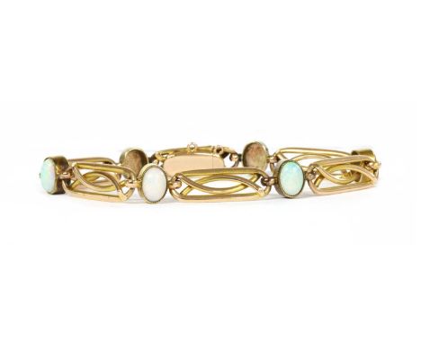 A gold opal bracelet, with oval cabochon opals, milligrain set to plain collets, and joined by oblong wire links, to conceale