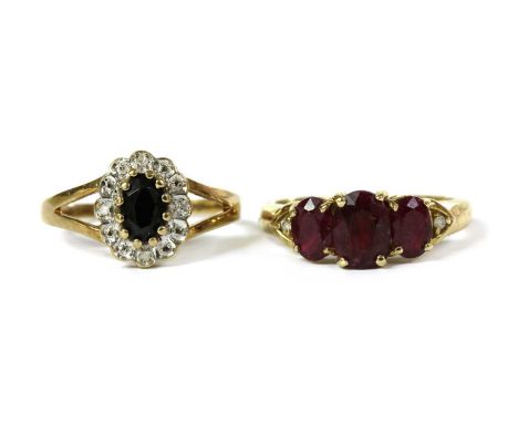 Two 9ct gold rings, to include a sapphire and diamond ring, Birmingham, and a three stone fracture filled ruby ring, Birmingh