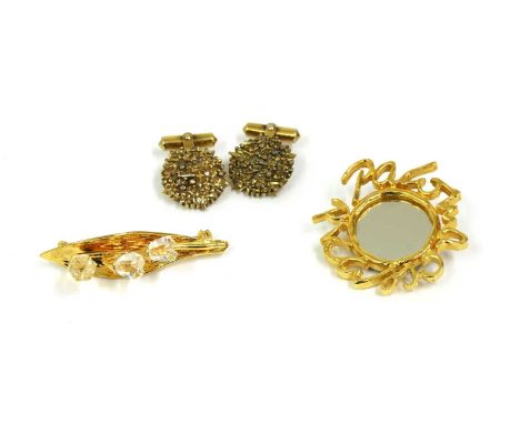 A Paloma Picasso mirror brooch, approximately 4cm diameter, together with a pair of Christian Dior cufflinks, and a Swarovski