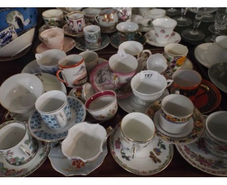 A Tray Containing Various Decorated Cabinet Coffee Cans and a Saucers 