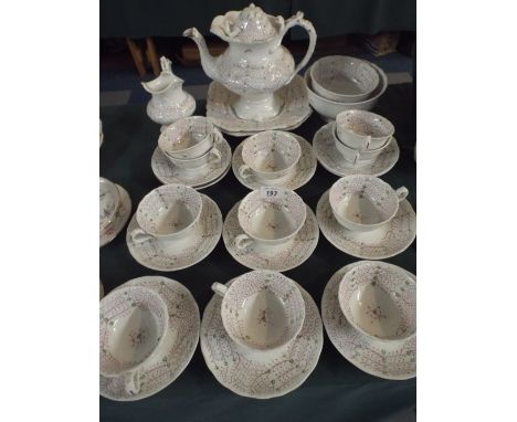 A 19th Century Teaset Comprising Nine Cups and Saucers, Two Sugar Bowls, Cream Jug, Teapot (AF) 