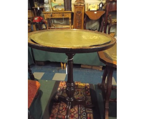 A Tooled Leather Topped Coffee Table and Tripod Wine Table