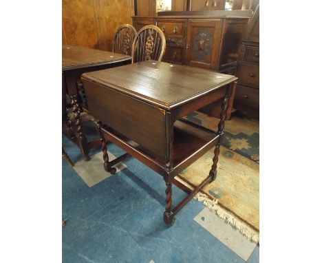 A Edwardian Oak Drop Leaf Barley Twist Trolley with Stretcher Shelf 