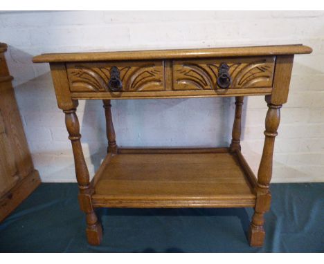 An Oak Two Drawer Side Table with Stretcher Shelf, 69cm Wide