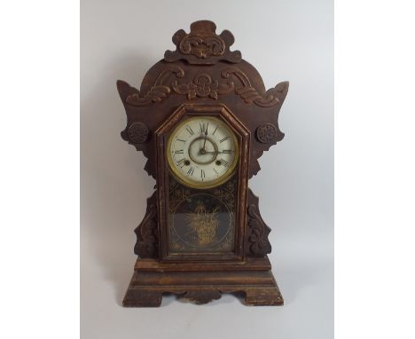 An American Gingerbread Clock by the New Haven Clock Company, 58cm high 